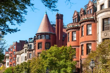 Elegant traditional residential houses and brownstones situated along the tree lined promenade of Commonwealth Avenue Mall in Back Bay Boston. © Jose Luis Stephens