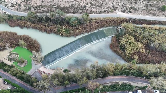 River in Archena Murcia. This stunning aerial view showcases the natural beauty of the river. Experience lush landscapes and tranquil waters. Perfect for nature enthusiasts.