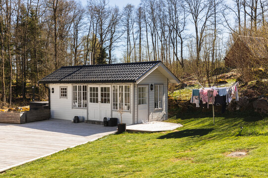 White Guest House with Laundry Drying