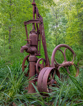 Old rusted water pump from the 1900s on farm in rural Virginia