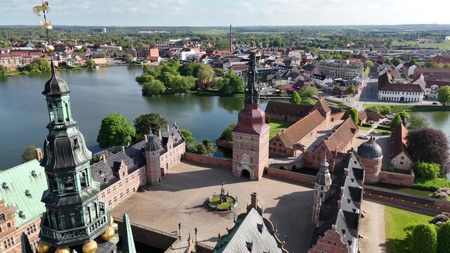Drone shot of towers and courtyard at Frederiksborg Castle, Hillerod, Denmark