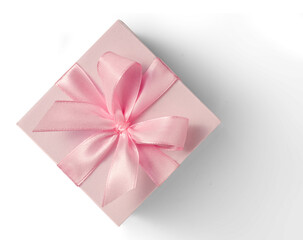 Fototapeta premium Pink gift box with pale ribbon bow on white or transparent background