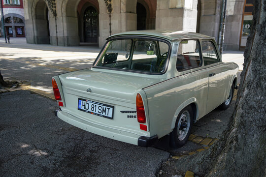 Rear view of a historic beige Trabant 601 S vintage car, highlighting the iconic tail lights and Duroplast body from the socialist GDR era, parked in Subotica, Serbia, on June 7, 2026