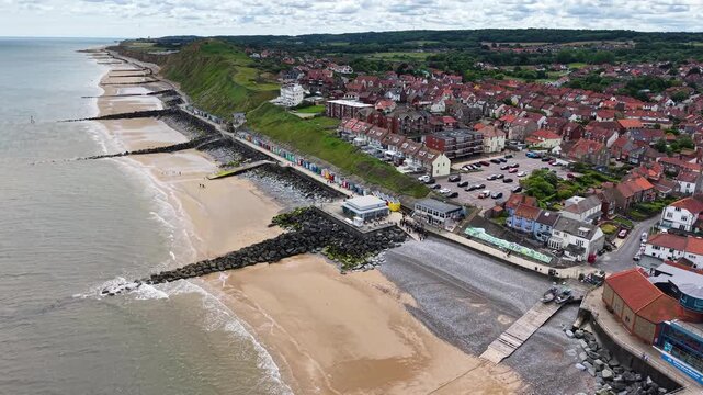 Aerial view of coastline and cliffs in Sheringham town, Norfolk, United Kingdom