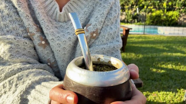 Traditional Argentine Mate Tea Infusion Warm Drink Lifestyle Scene on the Garden a Spring Day, Latin America