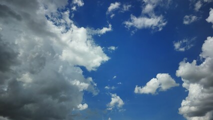 Fototapeta premium Dark storm clouds in dramatic blue sky before rain