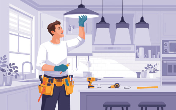 A man installing a light fixture in a modern kitchen with tools