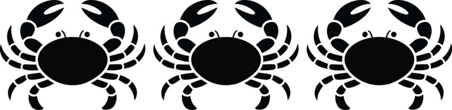 Three black and white crabs side by side