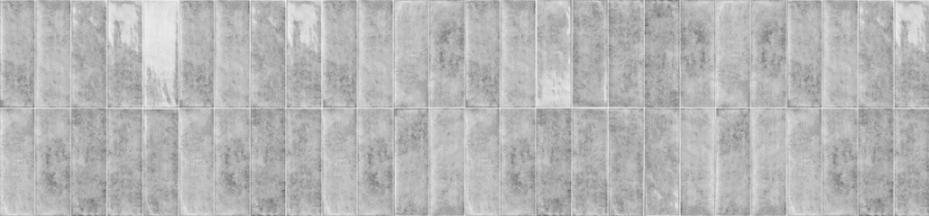 Fototapeta premium Gray weathered ceramic tiles arranged in a vertical running bond layout