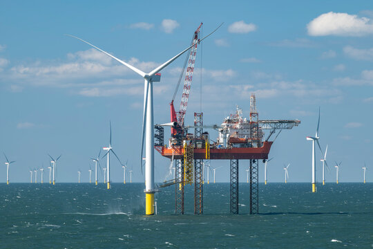 Offshore wind turbine installation vessel of the Burbo Bank windfarm in the Irish Sea near the UK coast between Heysham and the Isle of Man.