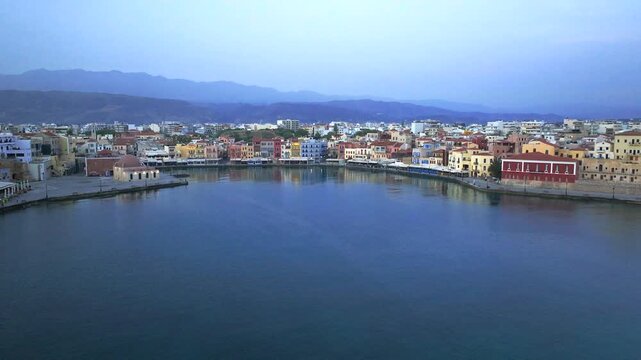 Beautiful Old city, Greece and best scenic places - panorama of picturesque old town Chania. Crete island, Panoramic of the old Venetian port and lighthouse during the blue hour, Travel Concepts