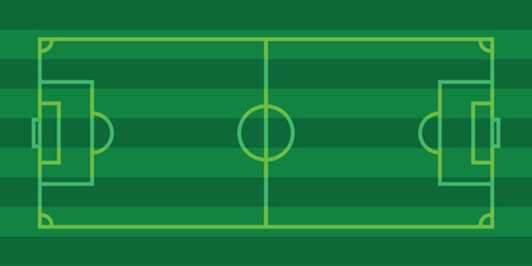 Obraz premium Green soccer field with yellow lines and markings for playing area goals and center circle for football or rugby match on striped grass surface