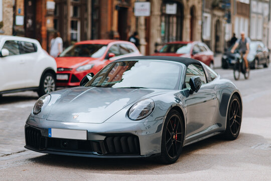 POLAND, GDANSK, JUNE 19, 2026 - Porsche 911 Targa Sports Car Parked on Urban Street in Poland