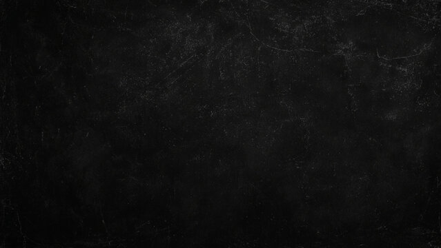 Dark scratched blackboard surface texture with cracks and scratches on wall education background