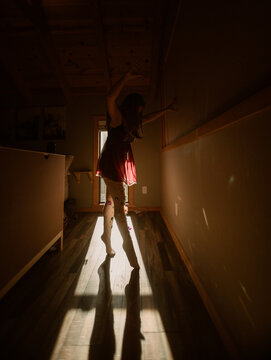 Woman dancing in light
