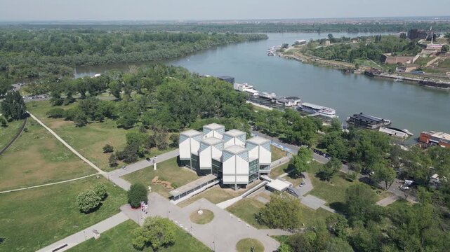 Drone pull back shot revealing Usce park and Sava river confluence with Danube, Belgrade, Serbia.