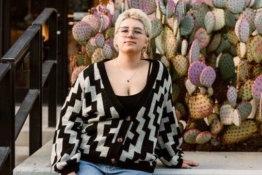Young woman with cactus