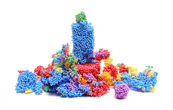 Colorful sticky styrofoam balls, toy modelling foam shape, soft and lightweight, isolated on white background