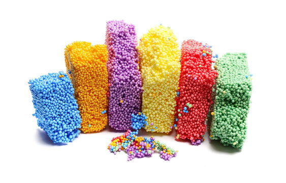 Colorful sticky styrofoam balls, toy modelling foam shape, soft and lightweight, isolated on white background