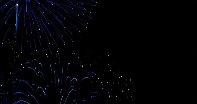 A dramatic celebration animation with vibrant blue fireworks exploding and sparkling along the right edge of the frame. Blue fireworks on edge