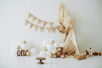First birthday celebration set with teepee and balloons © Iryna