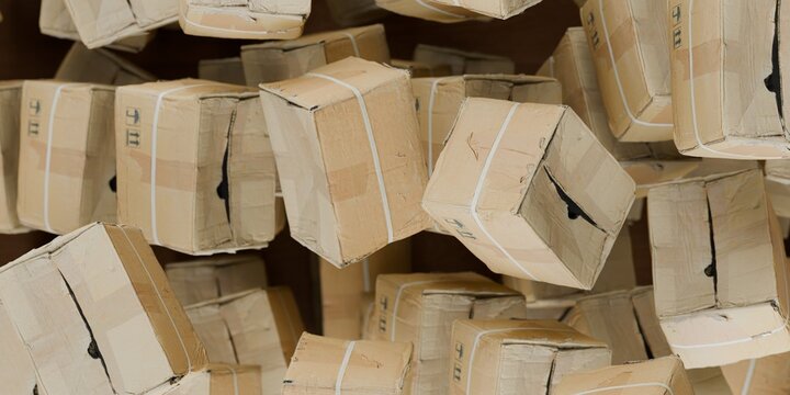 3d cardboard boxes in a pile on top of each other