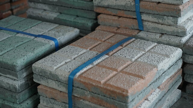 Bundled square concrete paving blocks with surface patterns