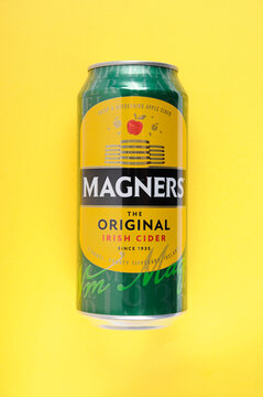 Can Magners Cider marketed as the original Irish Cider top view on yellow background with copy space