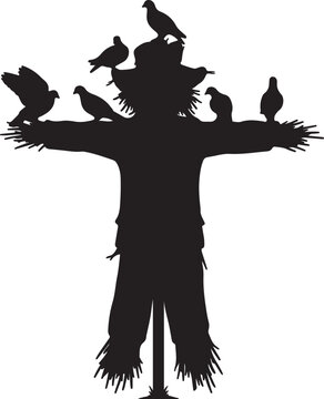 Silhouette of a Scarecrow with Birds Perched on it - Autumn Farm and Harvest Concept