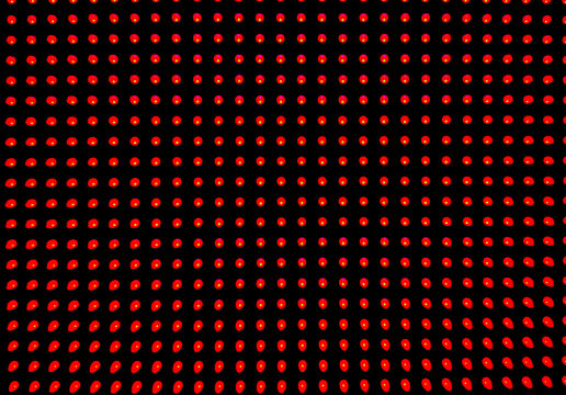 A grid pattern of red light emitting diodes (LEDs) arranged on a black electronic display panel