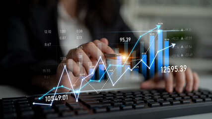 Professional analyzing growth trends and financial data represented through graphs in a modern...