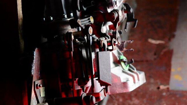 old gear shift box for front-wheel drive car cleaning from dirt with chemical agent and rinsing with water vertical video