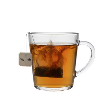 Transparent glass mug with steaming amber tea actively diffusing from a pyramid teabag, "Warmth" tag, white studio, polished reflection, macro. Dynamic infusion concept