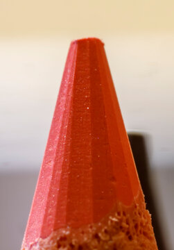 Macro of Red Geometric Cone Tip at pencil