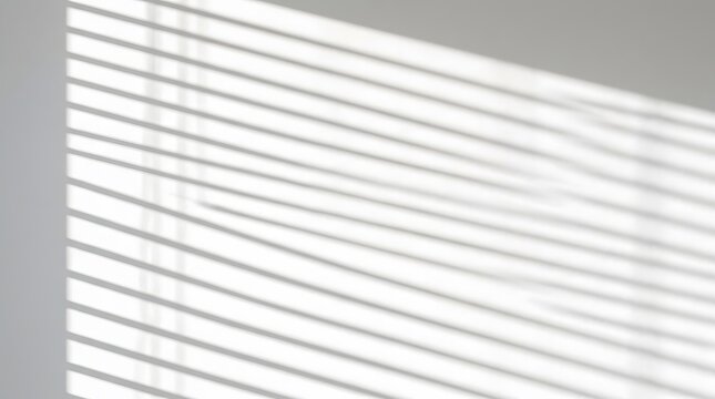 "Horizontal Blind Shadows Creating Parallel Lines on Clean White Wall"

