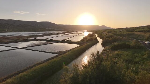 Drone footage of the famous Pag salt pans showing evaporation pools and traditional salt production landscape on Pag Island Croatia