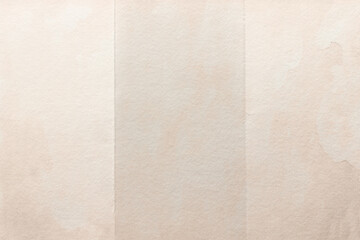 Fototapeta premium Subtle textured beige paper backdrop background