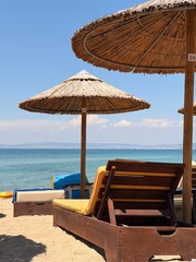 lounge chairs on the beach © Ekaterina