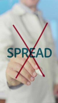 Medical professional in a lab coat crossing out the word 'spread' with a red marker, symbolizing the effort to stop the ebola virus epidemic and prevent further contagion of the deadly disease