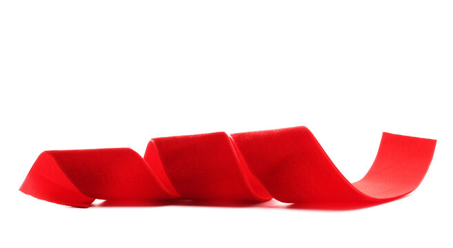 Red soft, plush, velvet ribbon isolated on white background, side view