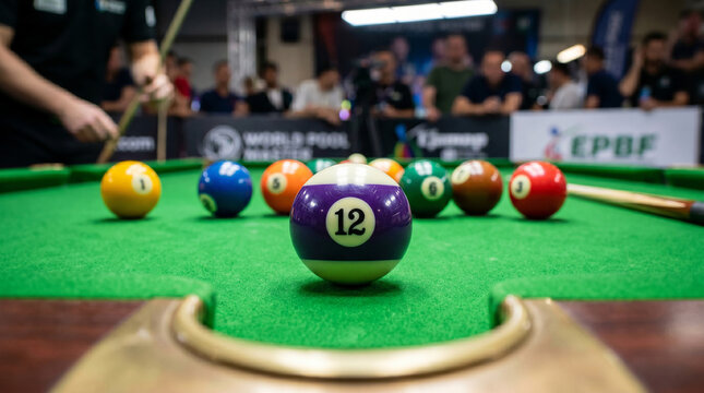 Billiard balls and cue stick on green pool table during game