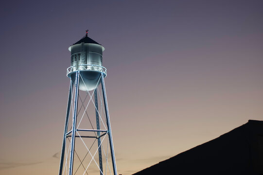Water tower at night in city of Gilbert Arizona