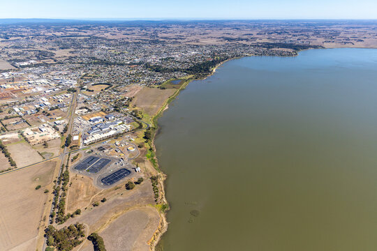 Colac aerial view of industrial area and residential housing and lakeshore, Victoria Australia