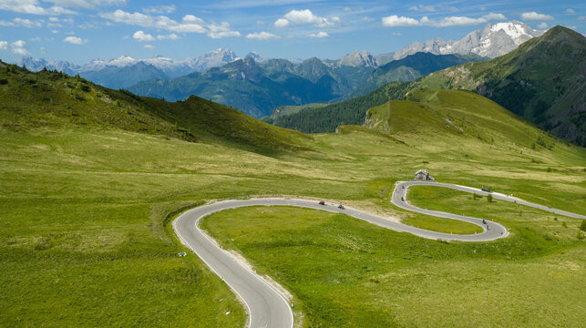 Panoramic Dolomite Mountains with Winding Alpine Road