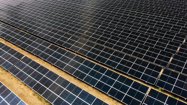 Solar Power Plant Aerial Flyover with Renewable Energy Panels
