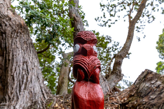 Maori art carvings and statue sculptures in square by artists in New Zealand