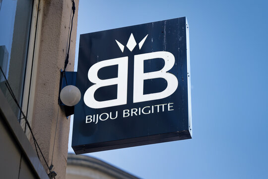 Cologne, Germany June 18 2026: Exterior shot of the black Bijou Brigitte retail store logo sign on the busy Schildergasse shopping street in Cologne, Germany