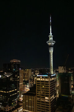 SkyCity Entertainment Group's Sky Tower rises above Auckland at night, as the casino and hospitality giant faces ongoing regulatory scrutiny over problem gambling and licensing obligations. Nov 2025