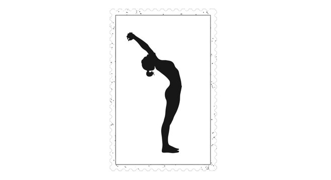Silhouette of a woman performing a standing backbend yoga pose.