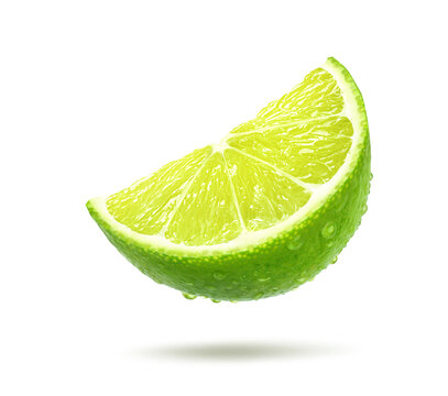 Fresh lime slice with water droplets isolated on white.